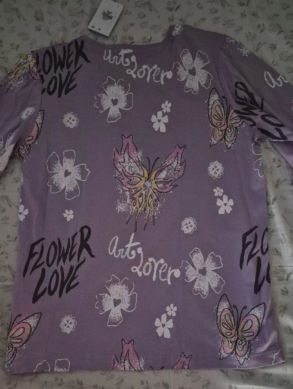NWT- Primark Care Long Sleeve Top. Lilac Butterfly and Floral Graphic Tee